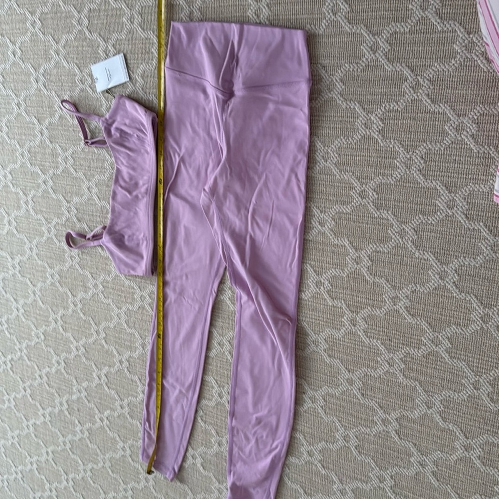 WE WORE WHAT. Workout set. Pants and sports bra. Never worn top w tag XS